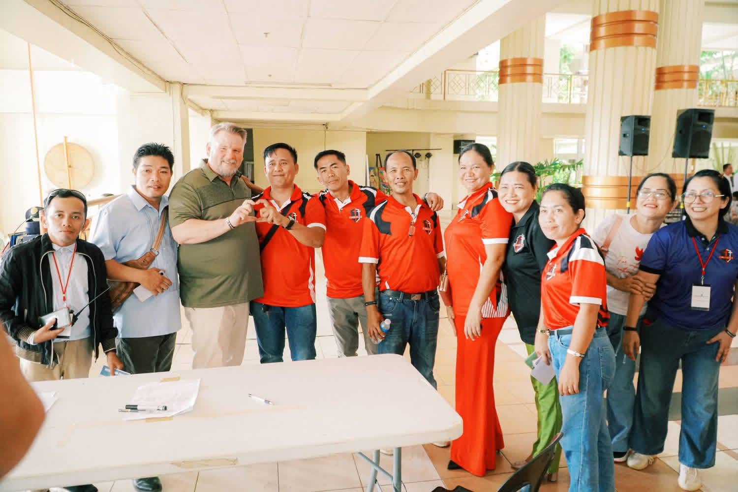 HomeTown Ministries team with Philippines ambassadors in CHOICES shirts